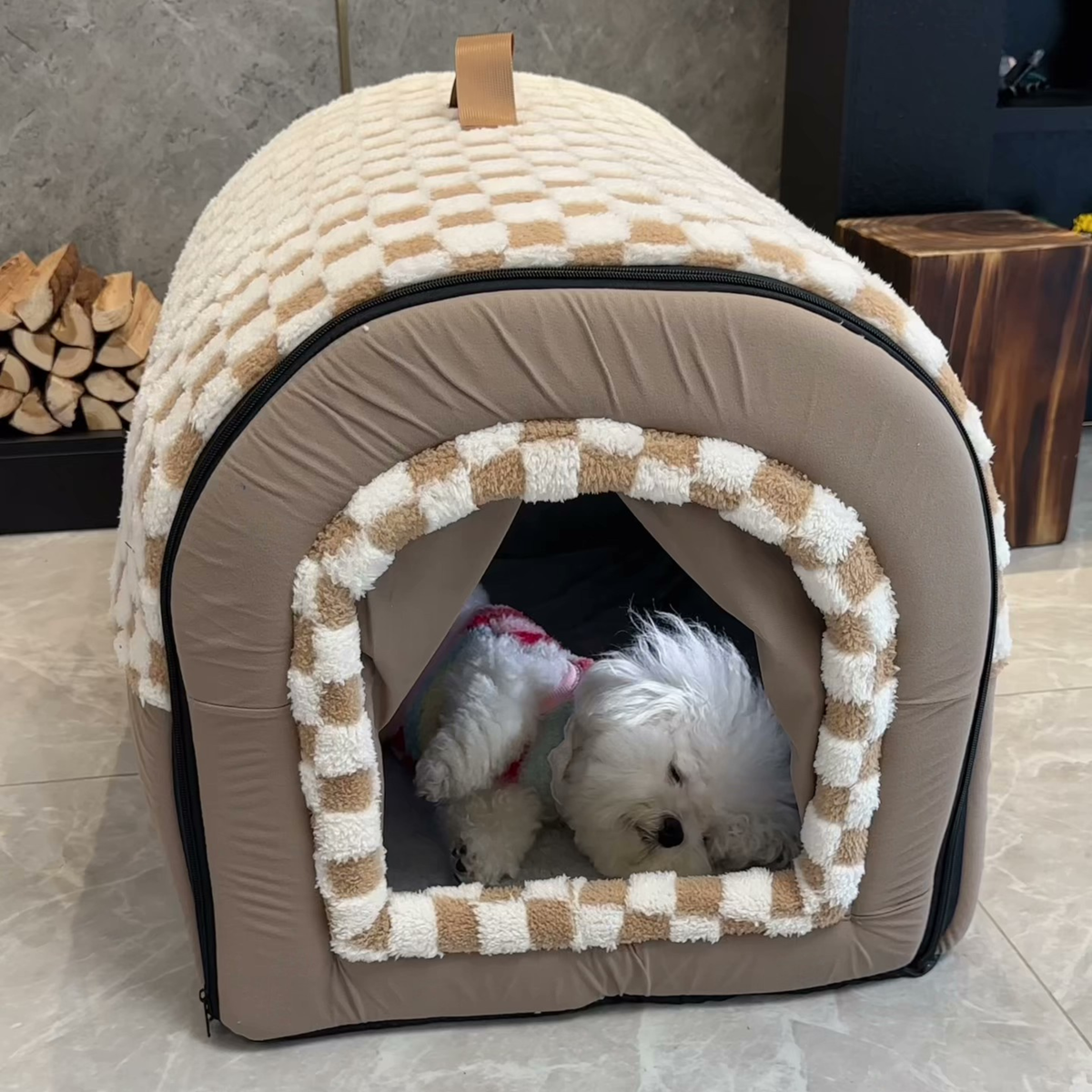Checkered covered dog house bed